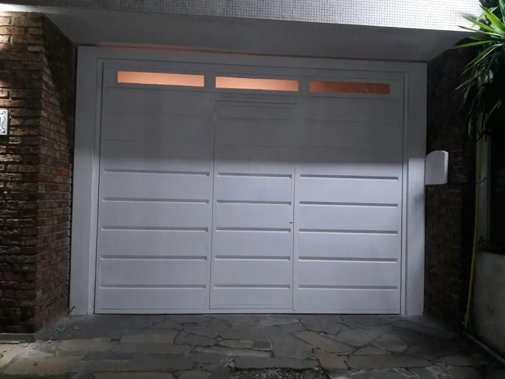Porton levadizo con puerta de escape - Flocemat Porton levadizo con puerta de escape - Flocemat